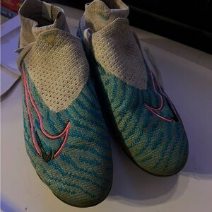 Nike Blue and Pink Sneakers with Slip-On Design and Textured Upper